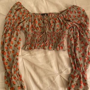 Cropped long sleeve blouse